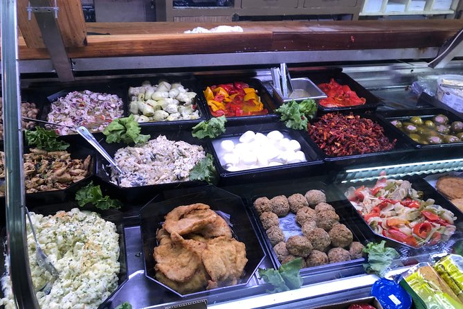 North Beach & Little Italy Walking Tour: Food, History & Flavor - Guide style and the group experience
