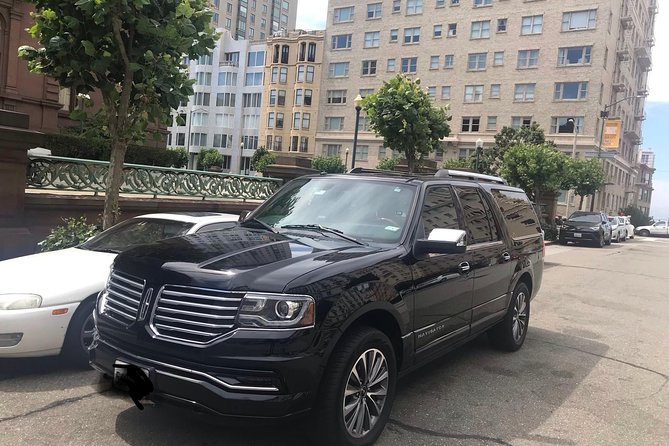 Private Transfer from San Francisco International Airport to San Francisco Hotel - The vehicle, luggage, and private group setup