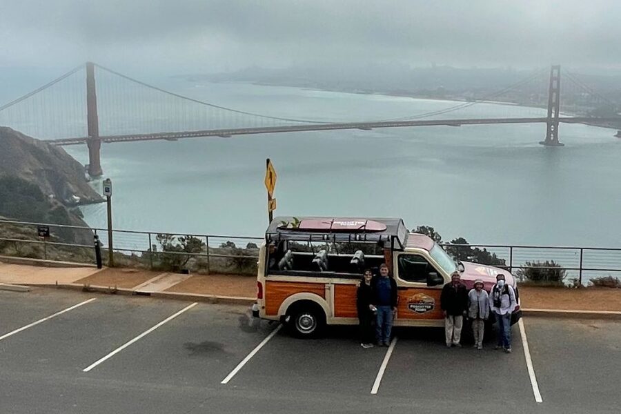 San Francisco: City Highlights Tour with Alcatraz Ferry - Riding through San Francisco in an open-sided van
