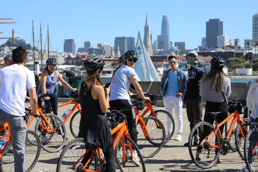 San Francisco: Golden Gate Bridge Guided Bike or eBike Tour - Riding beneath the Golden Gate towers