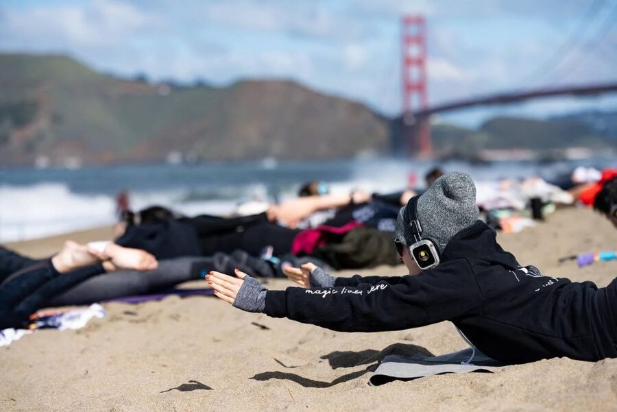 San Francisco: Silent Disco Yoga at Baker Beach - The instructors keep the class welcoming